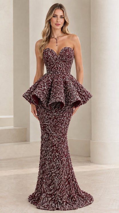 Full-length front view of the burgundy wine strapless embroidered peplum gown