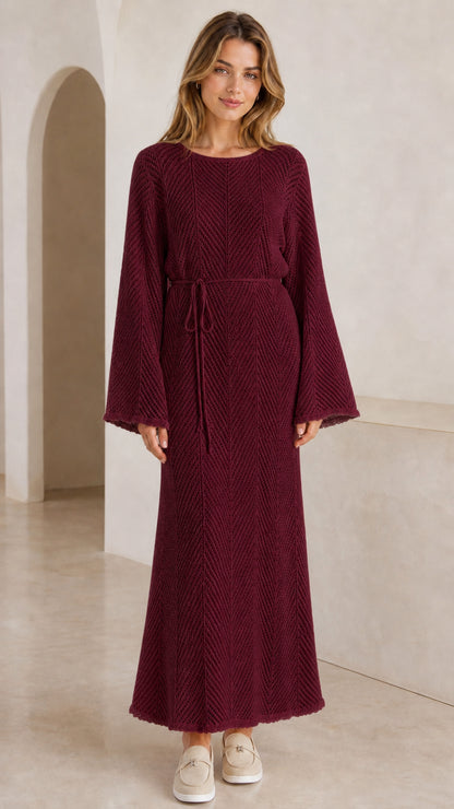Front view of model wearing burgundy wine textured knit bell sleeve maxi dress