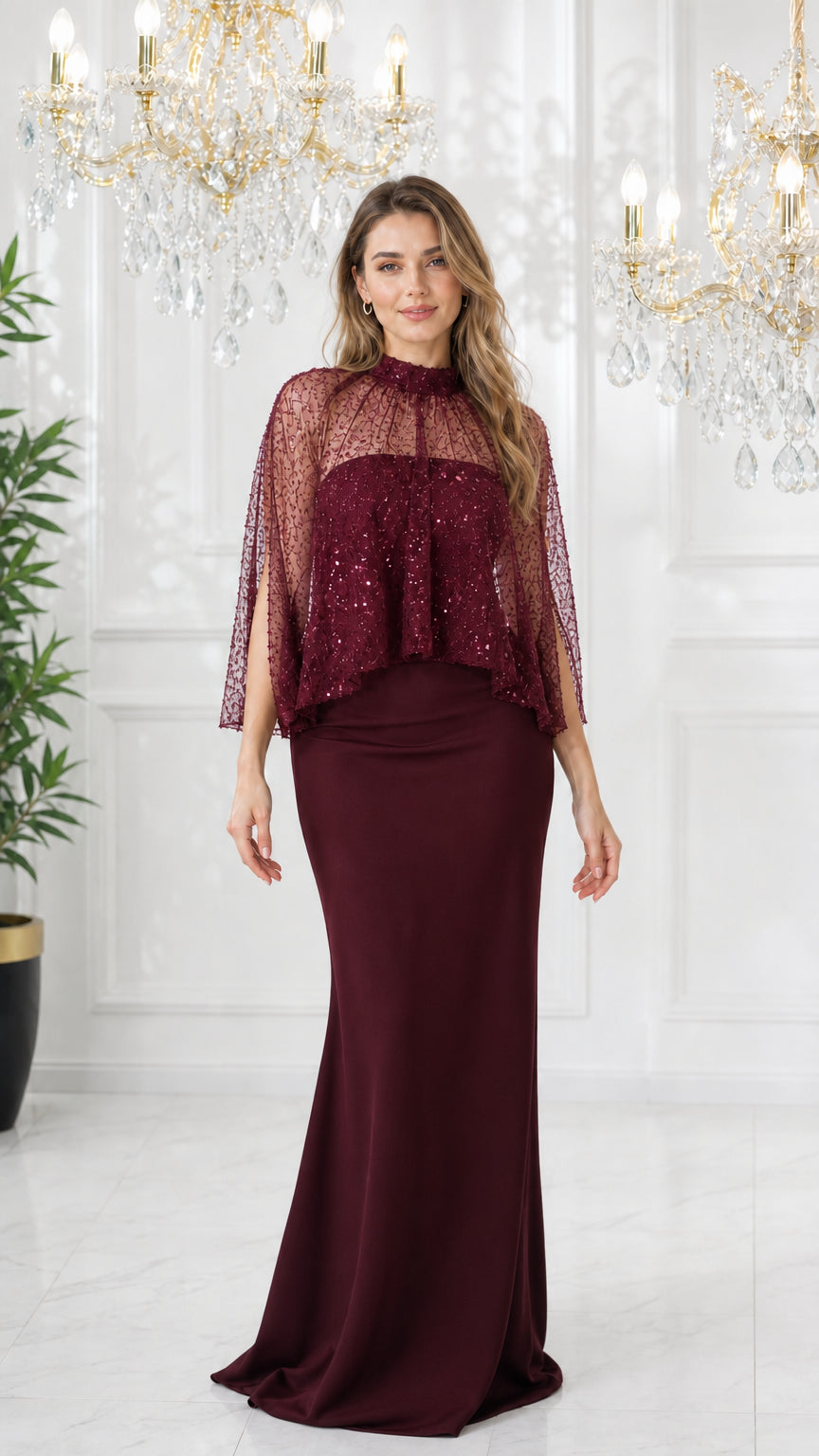 Model wearing monochromatic burgundy wine sequin capelet evening gown