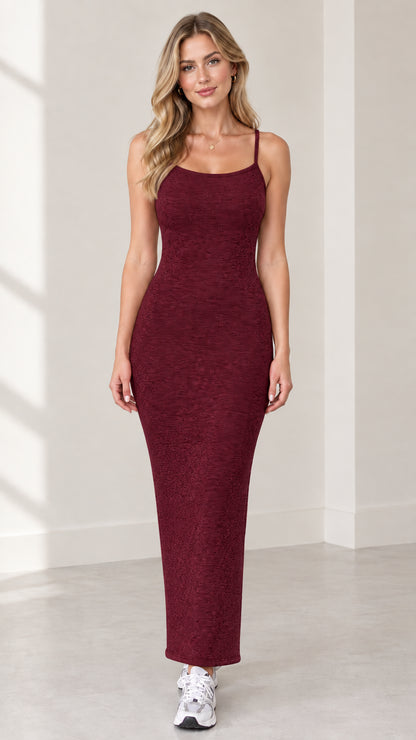 Model wearing a Burgundy ribbed knit spaghetti strap maxi dress