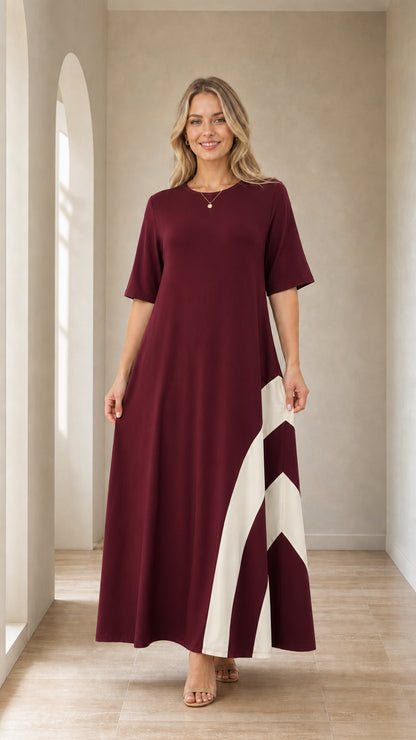 Front view of woman wearing Burgundy color-blocked maxi dress