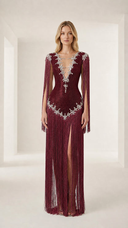 Front view of model wearing a burgundy crystal-embellished fringe evening gown