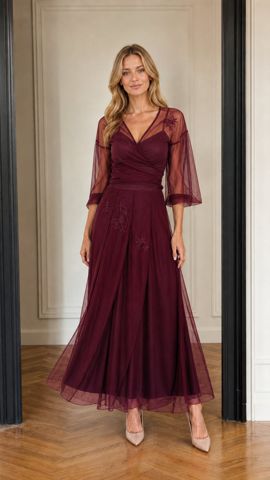 Model wearing burgundy wine floral tulle maxi gown