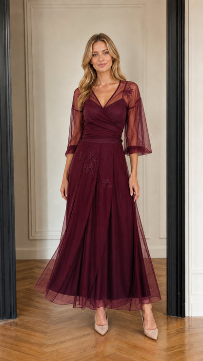 Model wearing burgundy wine floral tulle maxi gown