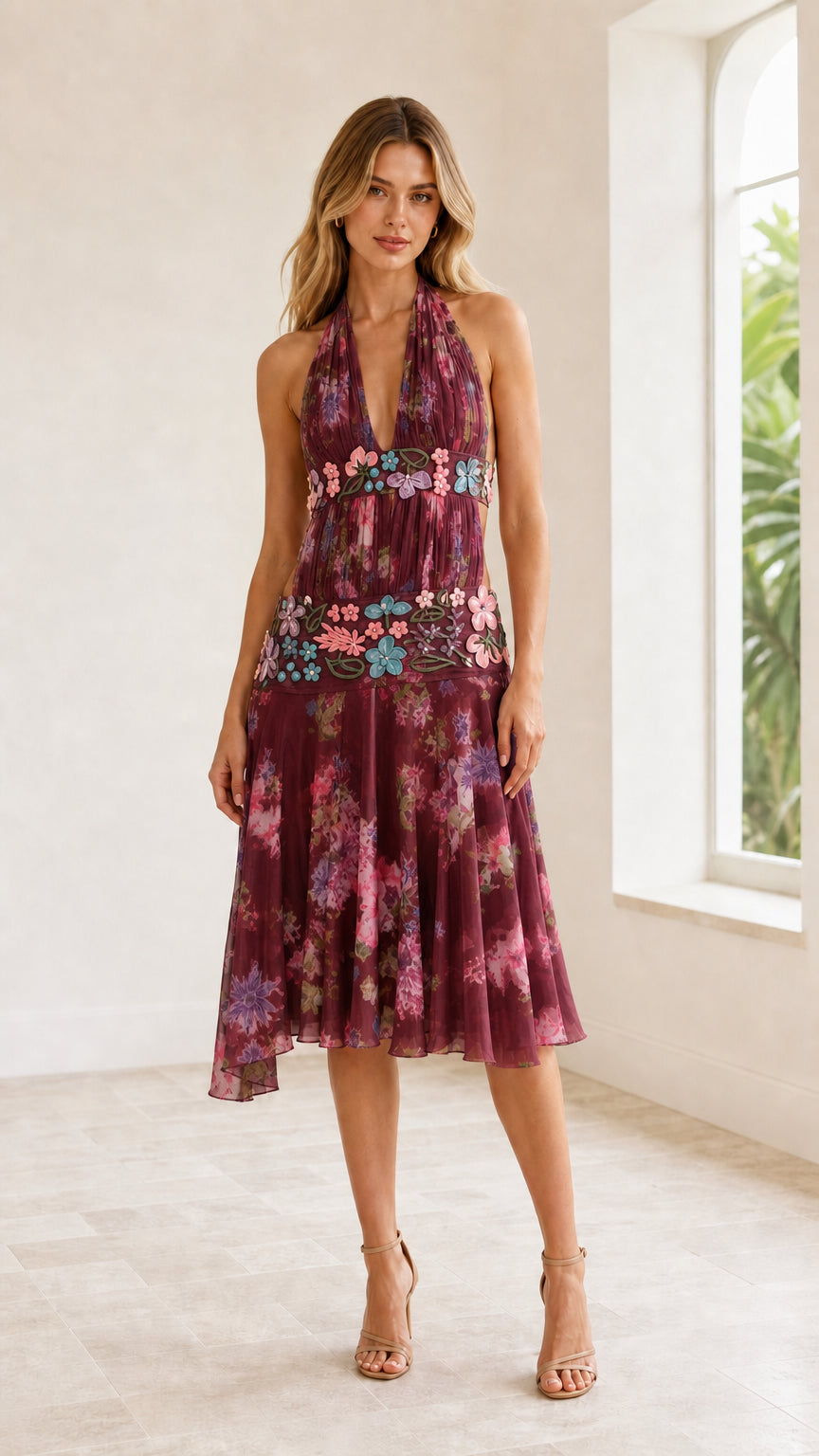 Front view of model wearing Burgundy wine floral halter cutout midi dress