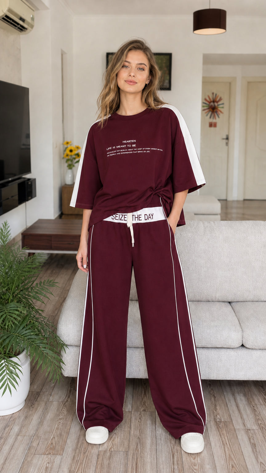 Full front view of model wearing burgundy maroon two-piece loungewear set