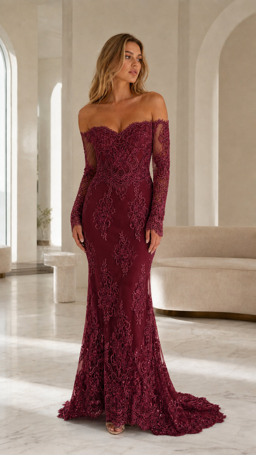 Model wearing burgundy off-the-shoulder lace evening gown