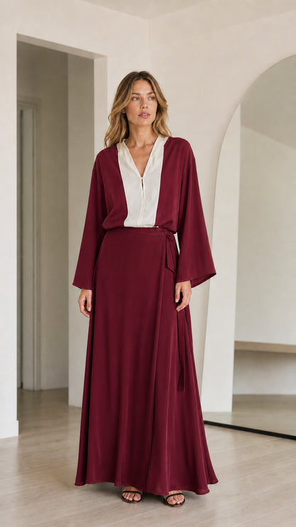 Model wearing Burgundy and white contrast long sleeve maxi dress