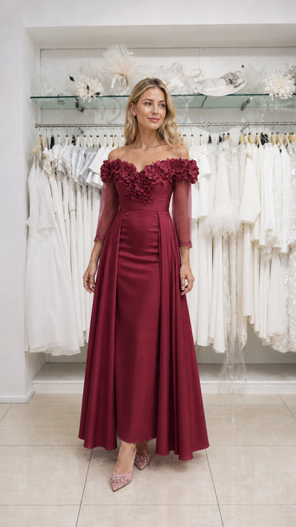 Model wearing burgundy formal evening gown