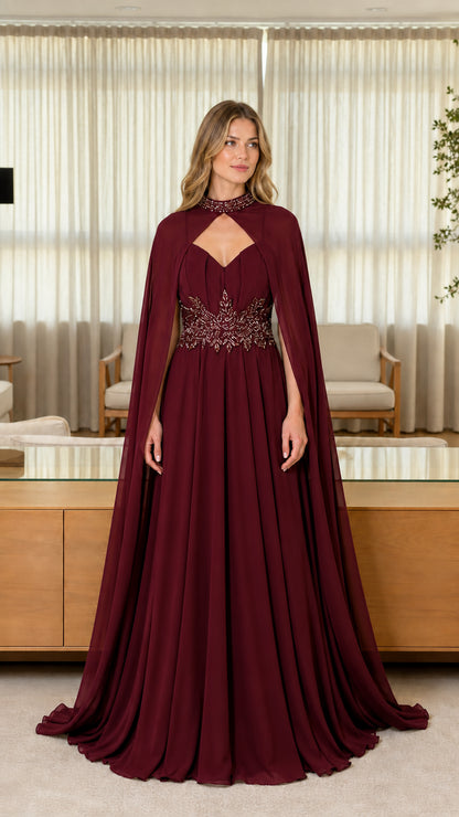 Front view of burgundy evening dress with cape