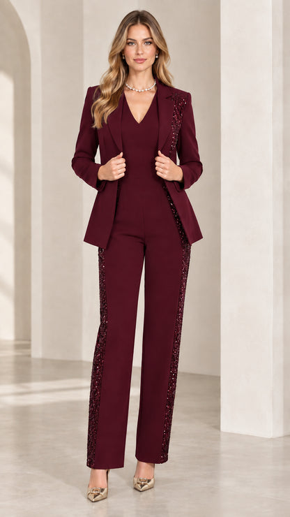 Front view of woman wearing burgundy wine red sequin-trim blazer and trousers suit set