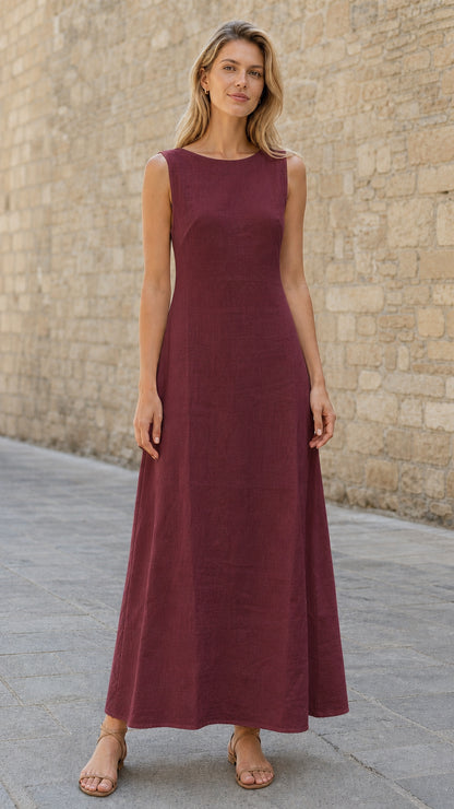 Woman wearing burgundy sleeveless maxi dress