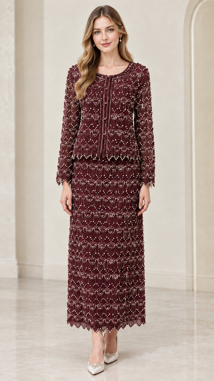 Front full-length view of woman wearing burgundy wine beaded two-piece maxi skirt suit