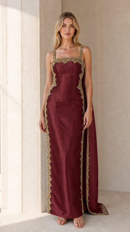 Front view of Burgundy embellished cape maxi dress