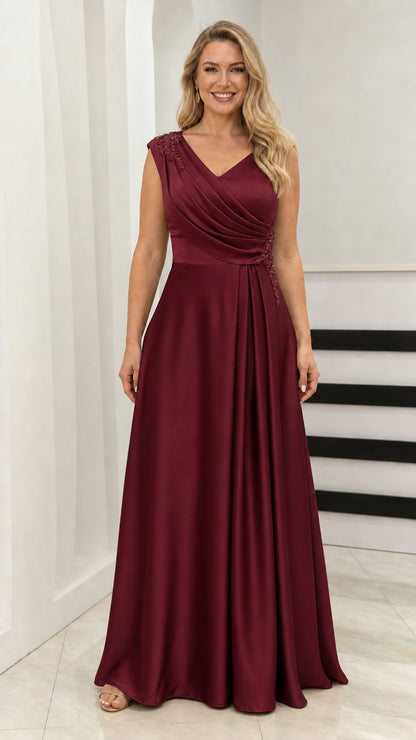 Model wearing burgundy V-neck evening dress