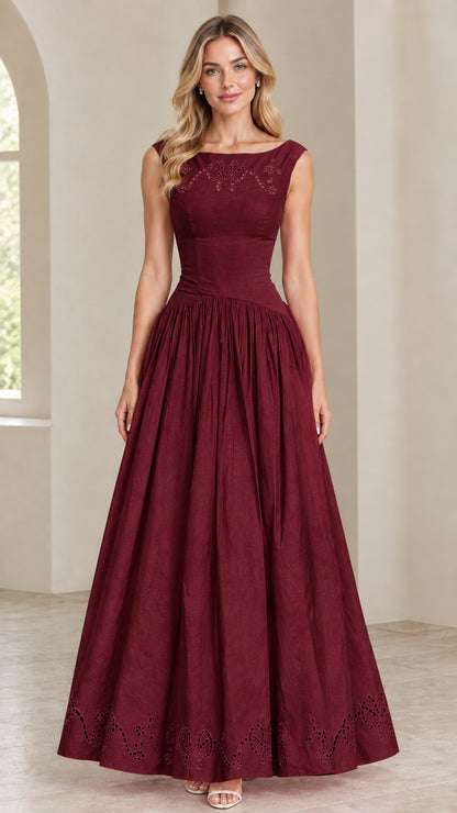 Model wearing Burgundy red sleeveless embroidered formal maxi dress