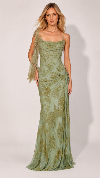 Front view of sage green glitter mesh gown with cowl neckline and sheer scarf detail