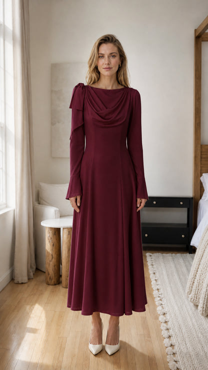 Front view of model wearing burgundy cowl neck midi dress