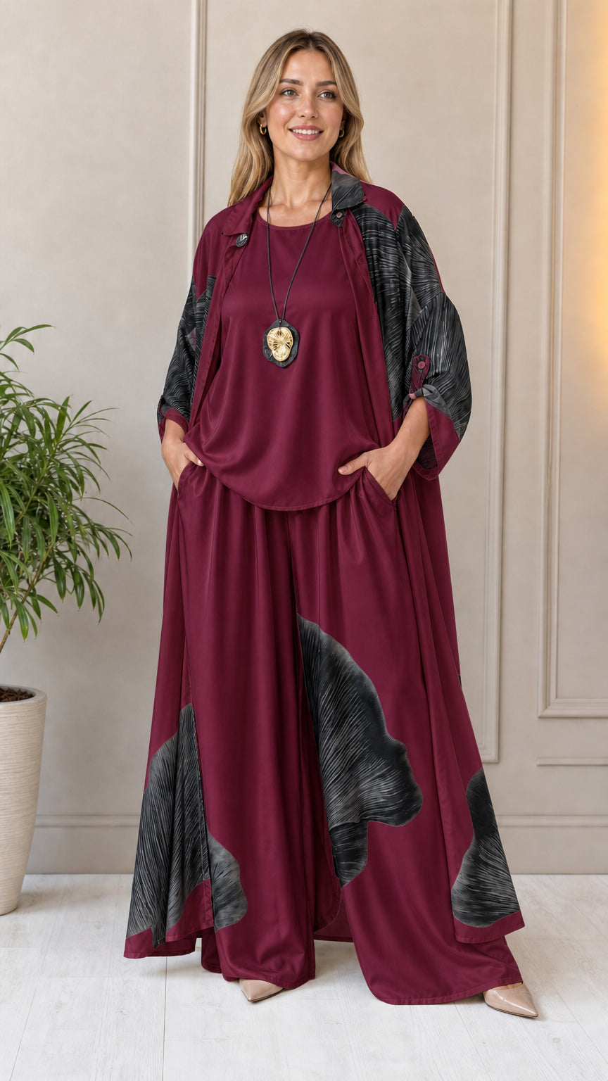 Woman wearing burgundy abstract print 3-piece set