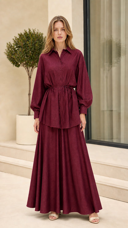 Full-length view of woman wearing Burgundy long-sleeve shirt and maxi skirt set