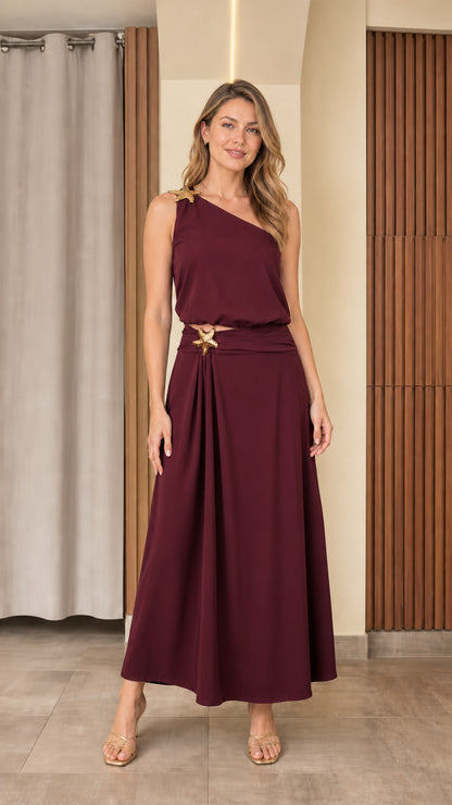 Front view of woman wearing burgundy wine one-shoulder maxi two-piece set