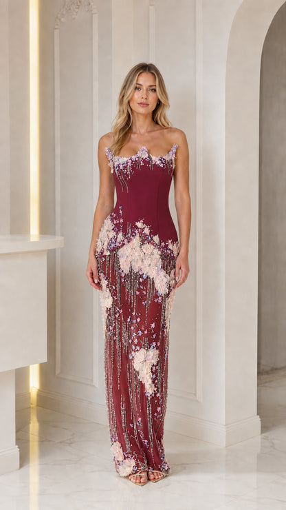Front view of burgundy embellished strapless gown