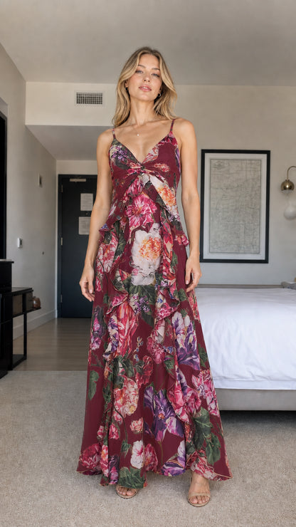 Model wearing burgundy floral print ruffle maxi dress