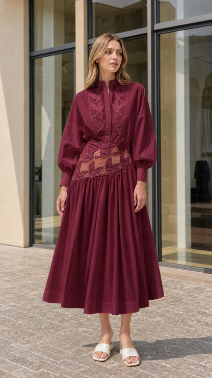 Model wearing burgundy wine red cutout embroidered midi dress