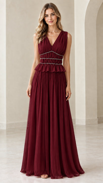 Front view of burgundy red sleeveless pleated formal maxi dress