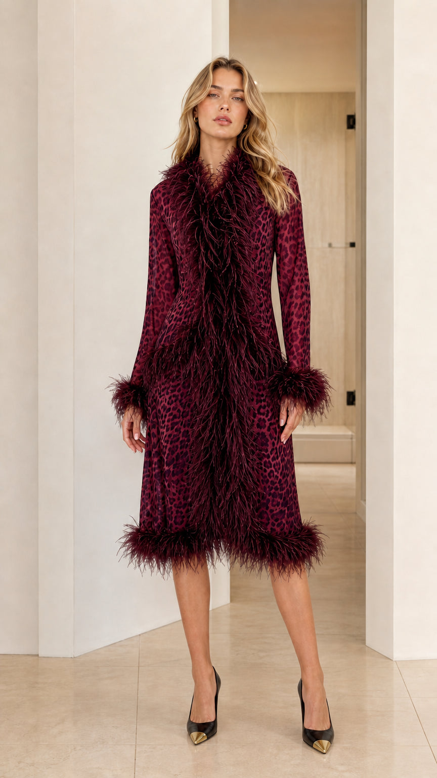 Model wearing the deep burgundy wine leopard print midi coat with matching trim