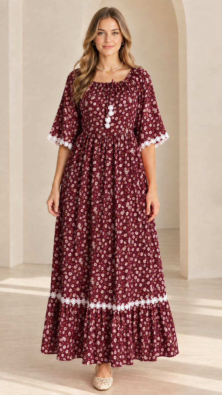 Front view of model wearing burgundy wine floral tiered maxi dress