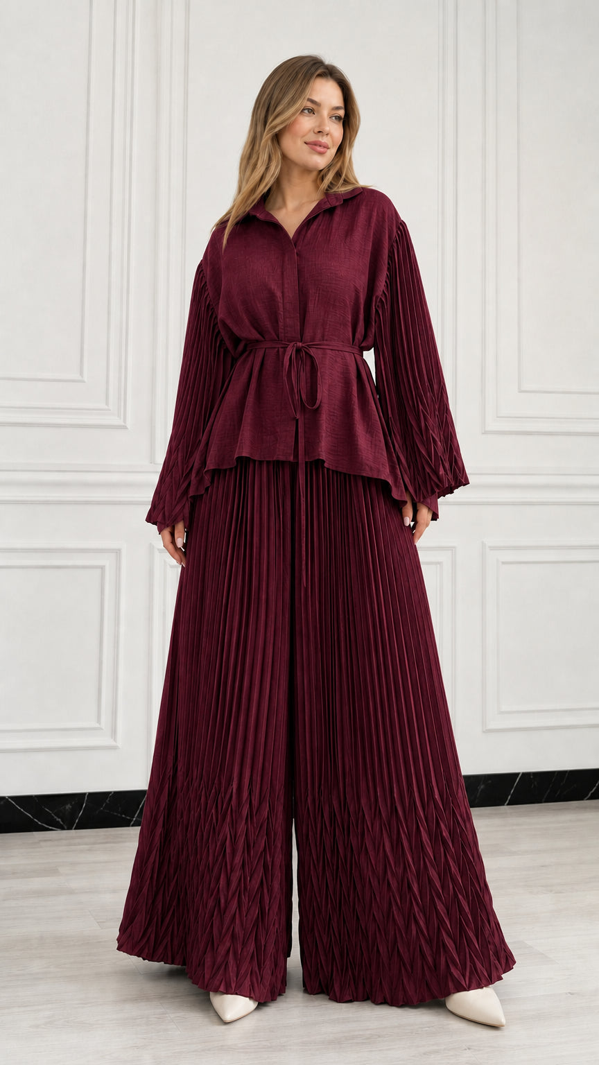 Full front view of woman wearing Burgundy wine pleated two-piece pant set