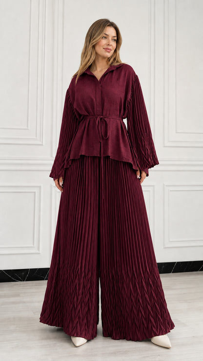 Full front view of woman wearing Burgundy wine pleated two-piece pant set