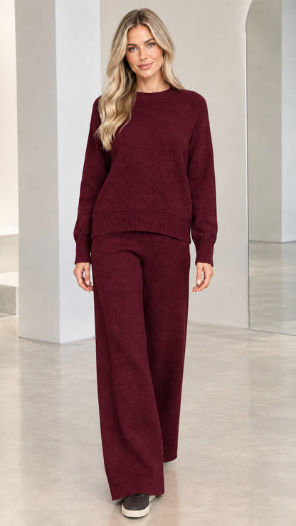 Model wearing burgundy 2-piece knit sweater and wide-leg pants set
