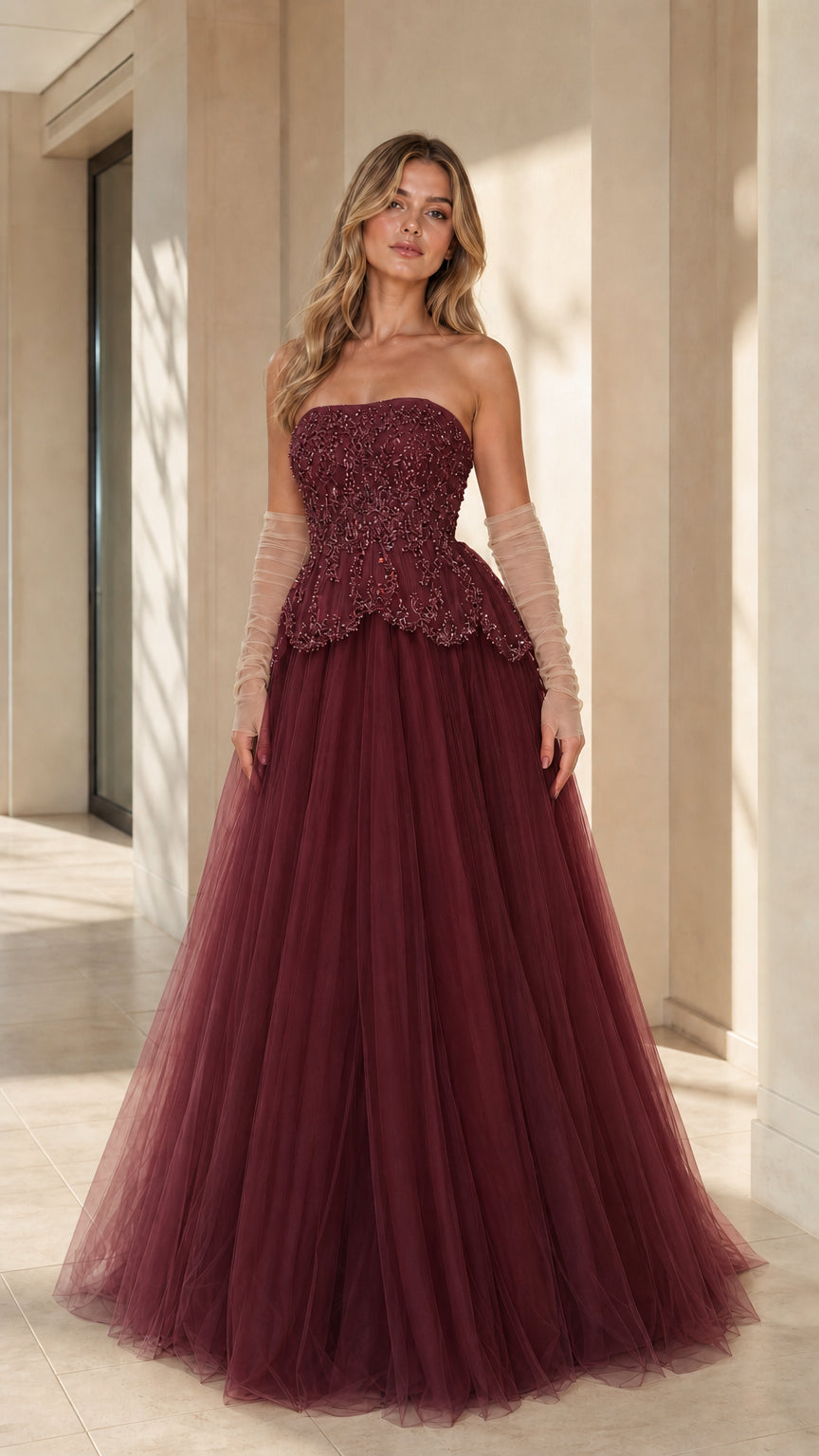 Full-length front view of the strapless beaded tulle ballgown in burgundy