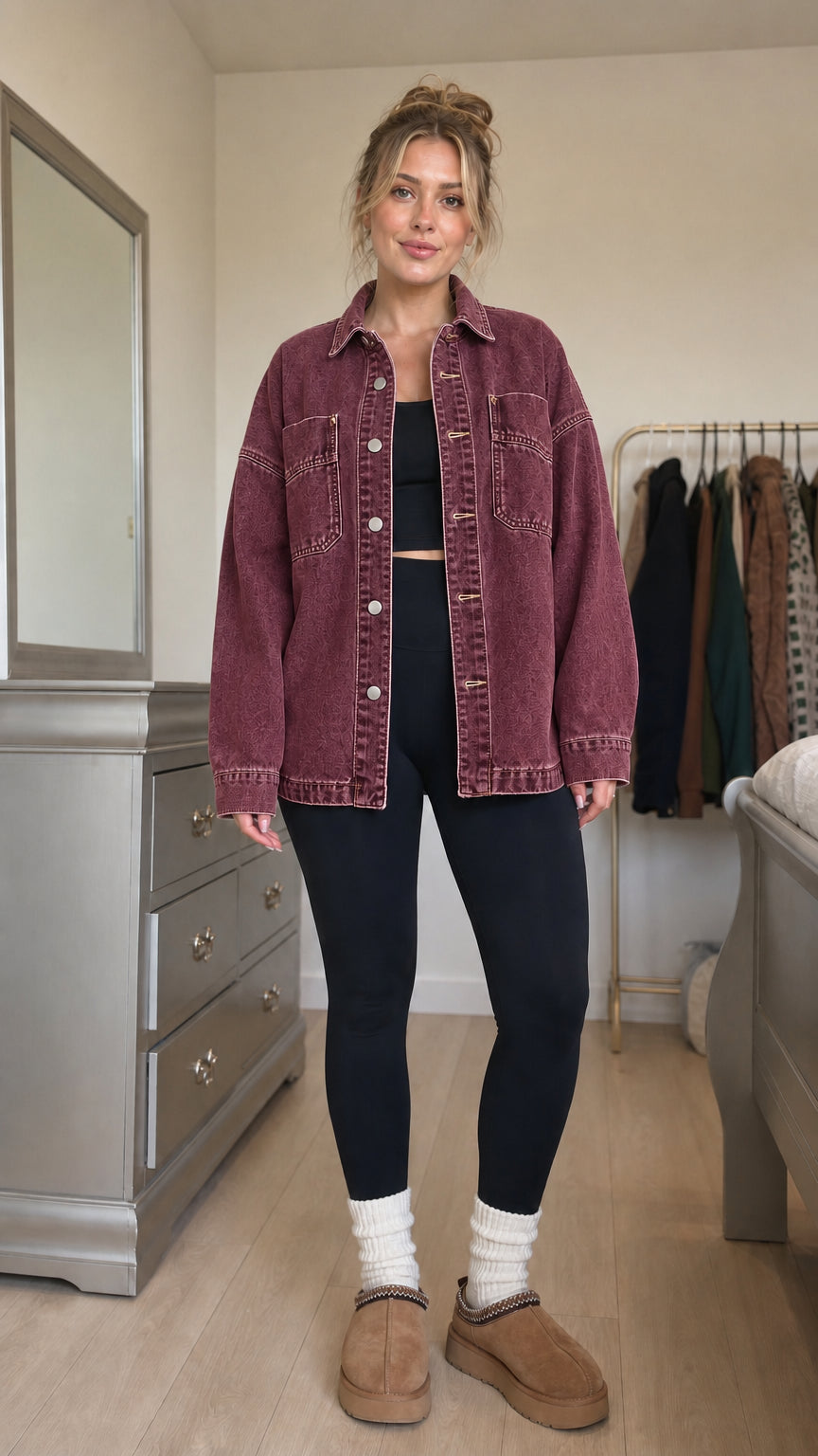 Front view of model wearing burgundy denim shacket