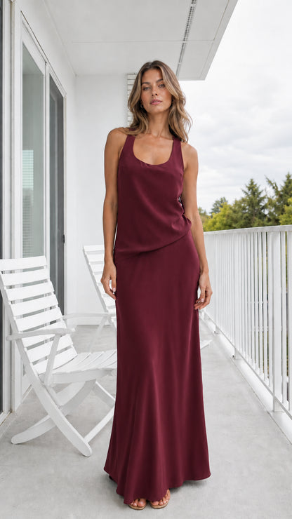 Model wearing deep burgundy scoop neck maxi dress