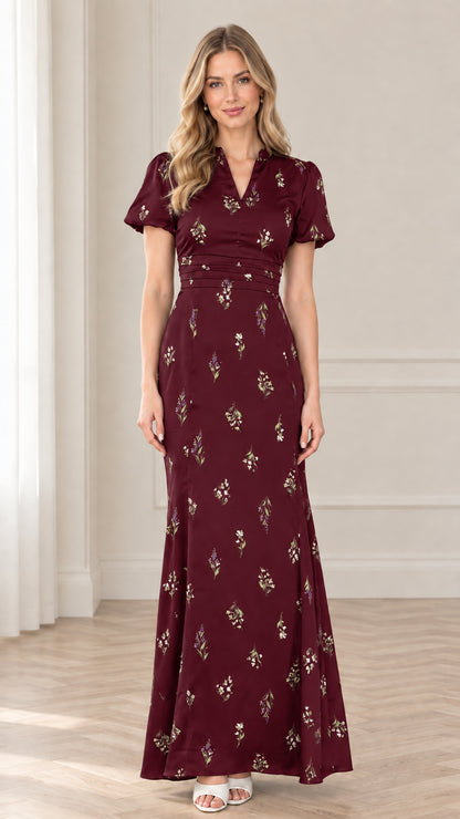 Front view of model wearing burgundy wine red floral print maxi dress