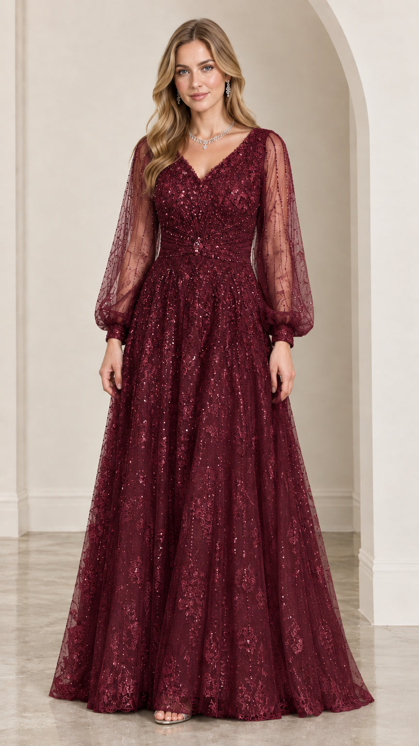 Model wearing Burgundy long sleeve beaded maxi evening dress