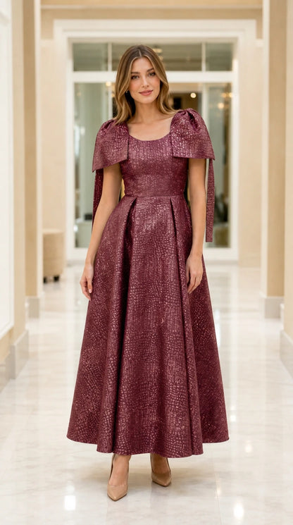 Full-length view of model wearing Burgundy wine capelet jacquard maxi evening dress