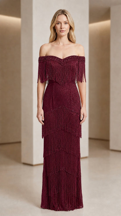 Front view of woman wearing burgundy off-shoulder beaded fringe evening gown