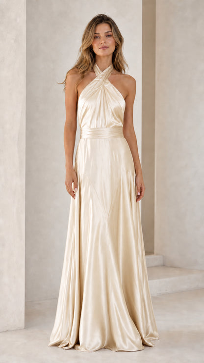 Full-length view of Champagne halter cross-front backless satin maxi dress