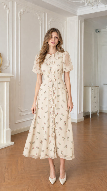 Full front view of cream beige floral bow-front midi dress