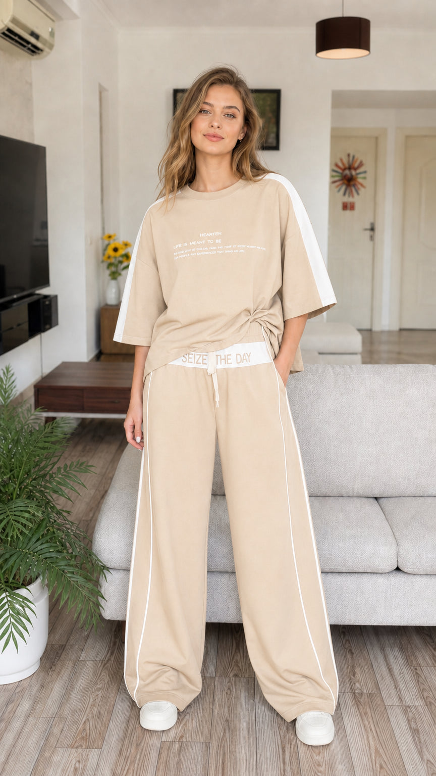 Full front view of model wearing beige khaki two-piece loungewear set