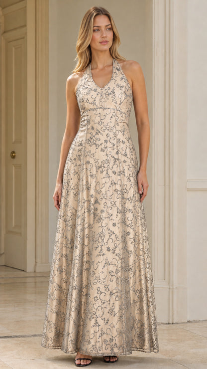 Model wearing champagne gold halter neck embroidered formal evening gown