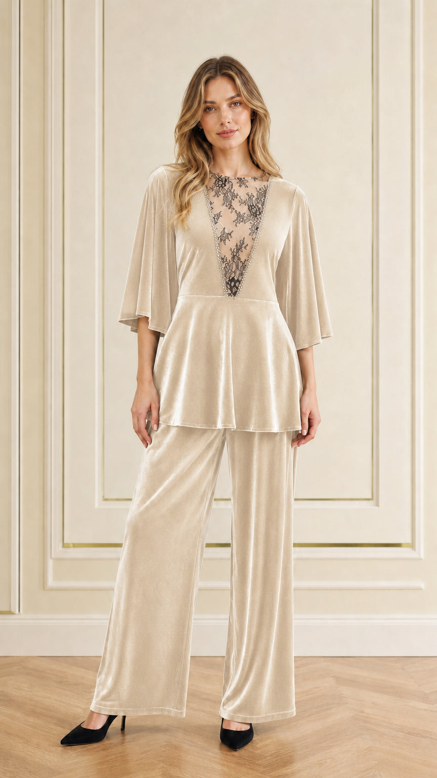 Front view of woman wearing champagne cream velvet two-piece pant set