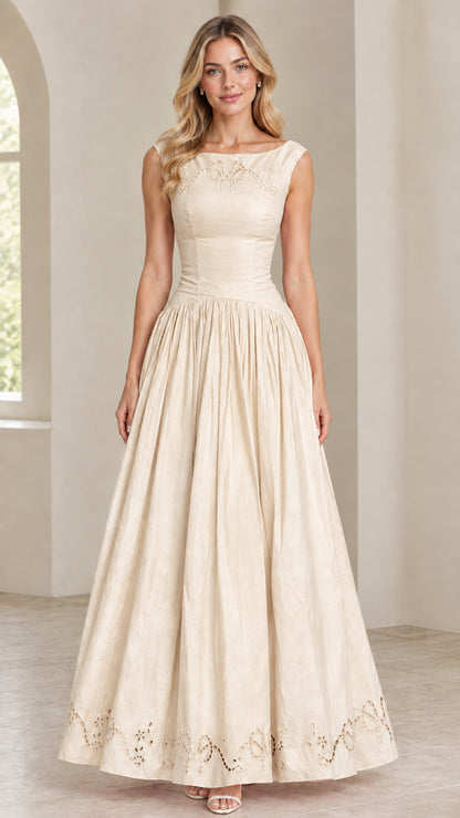 Model wearing Champagne cream sleeveless embroidered evening maxi gown