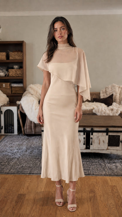 Front view of champagne mock neck cape sleeve midi dress