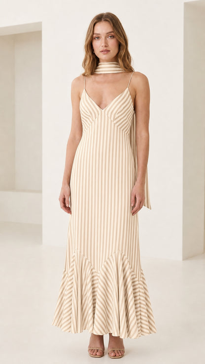 Front view of model in cream striped cami maxi dress