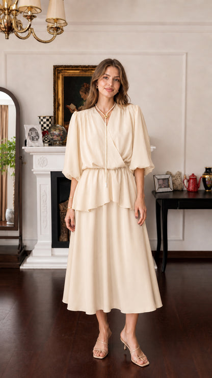 Model wearing beige V-neck layered midi dress